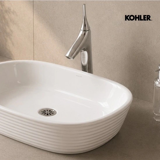 Kohler ribbed vessel basin with tall faucet